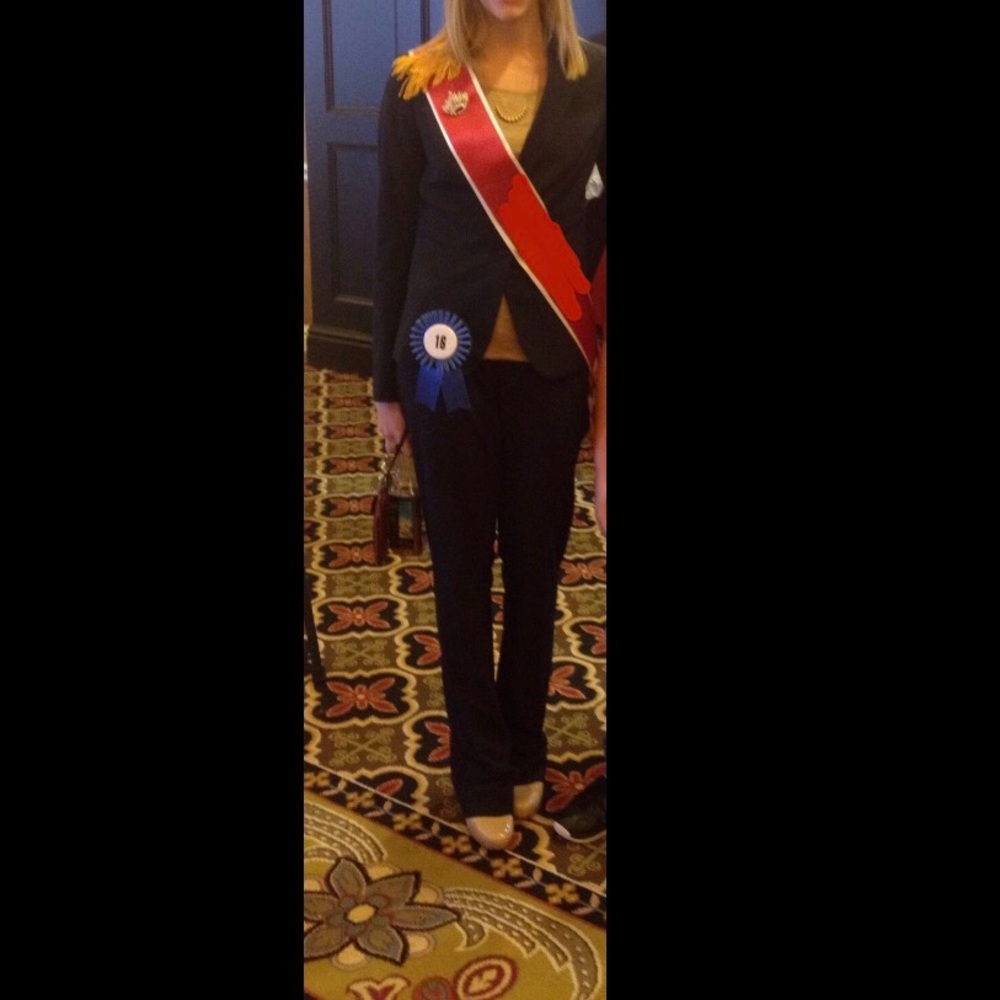 Formal navy blue pant suit and blazer